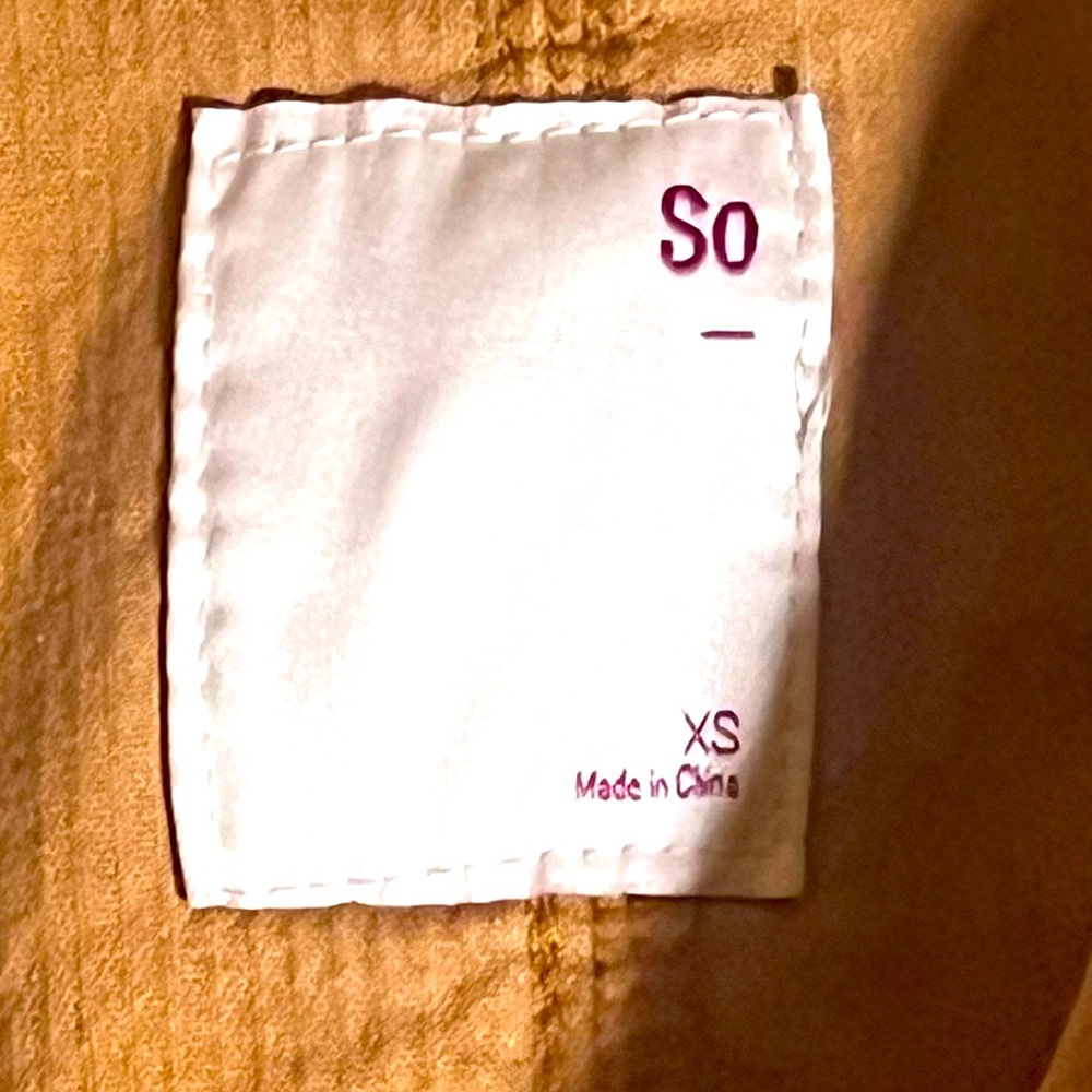 Dark Linen, cotton, Brand is “ SO “ , Zipper included.